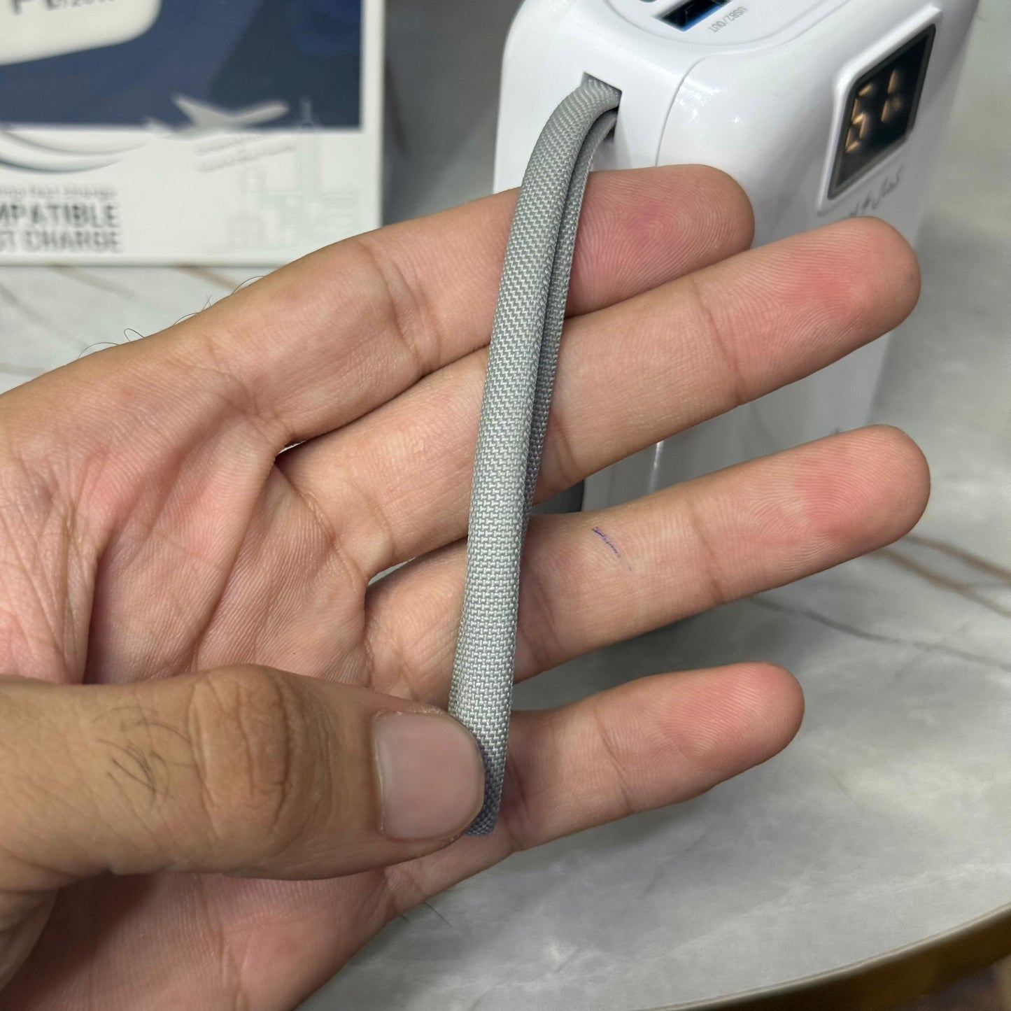 Made in Dubai 120W Mini Size Super Fast Power Bank With Built In Cables 1 Year Company Warranty