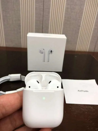 Apple AirPods Wireless Ear Buds, Bluetooth Headphones with Lightning Charging Case Included, Over 24 Hours of Battery Life