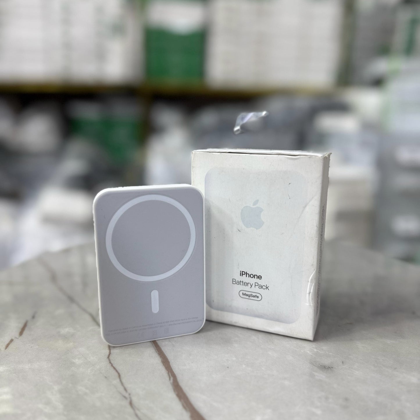Slim and modern MagSafe-compatible wireless power banks in white, designed for fast and efficient charging. Featuring a sleek rectangular design with a circular magnetic alignment, these portable chargers provide seamless attachment for iPhone users seeki