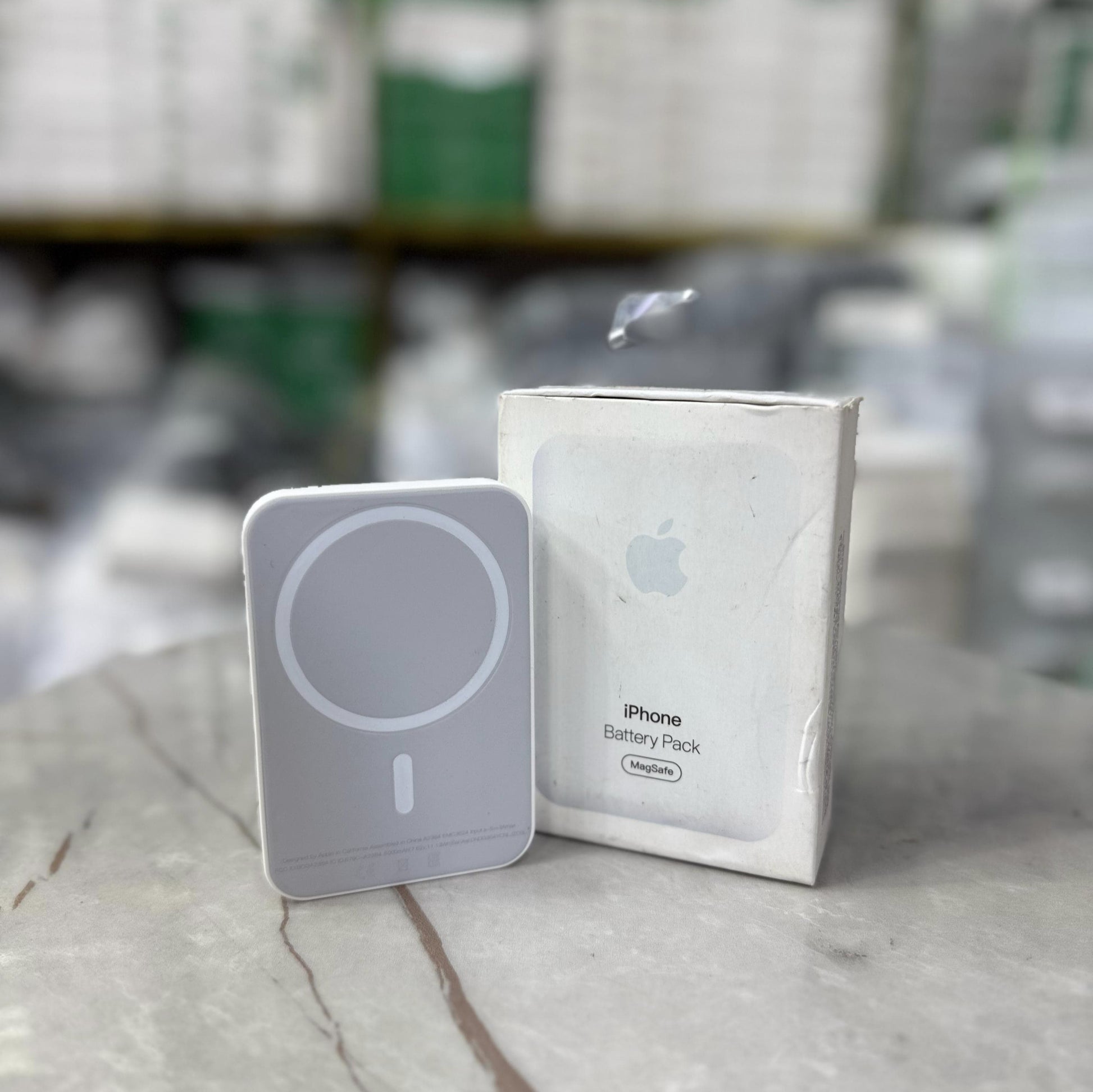 Slim and modern MagSafe-compatible wireless power banks in white, designed for fast and efficient charging. Featuring a sleek rectangular design with a circular magnetic alignment, these portable chargers provide seamless attachment for iPhone users seeki