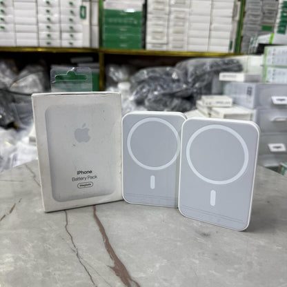 Slim and modern MagSafe-compatible wireless power banks in white, designed for fast and efficient charging. Featuring a sleek rectangular design with a circular magnetic alignment, these portable chargers provide seamless attachment for iPhone users seeki