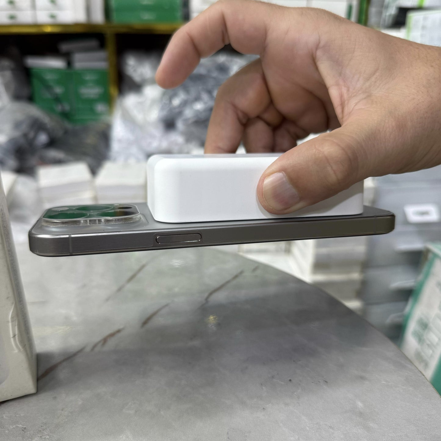 Slim and modern MagSafe-compatible wireless power banks in white, designed for fast and efficient charging. Featuring a sleek rectangular design with a circular magnetic alignment, these portable chargers provide seamless attachment for iPhone users seeki