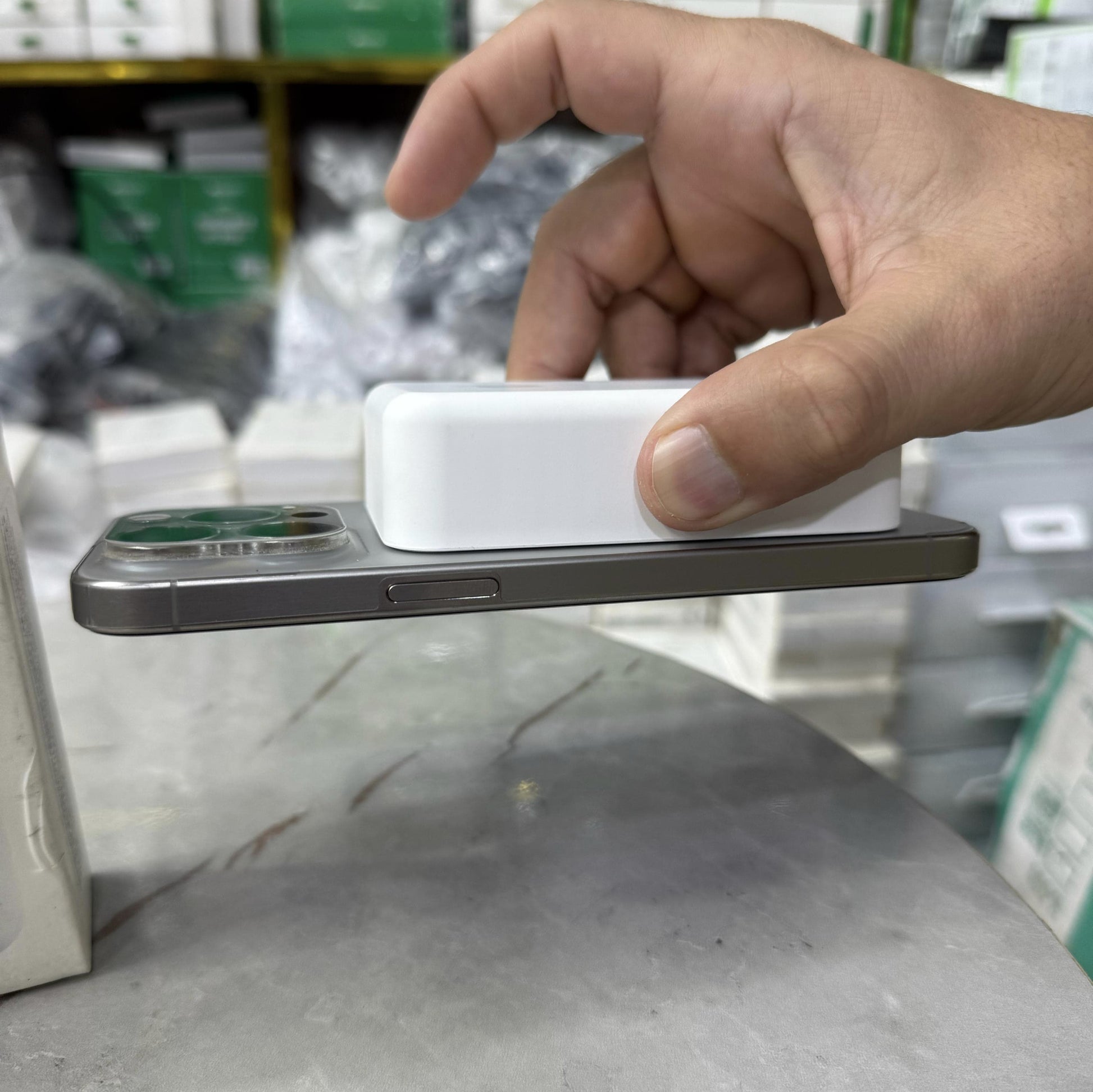 Slim and modern MagSafe-compatible wireless power banks in white, designed for fast and efficient charging. Featuring a sleek rectangular design with a circular magnetic alignment, these portable chargers provide seamless attachment for iPhone users seeki