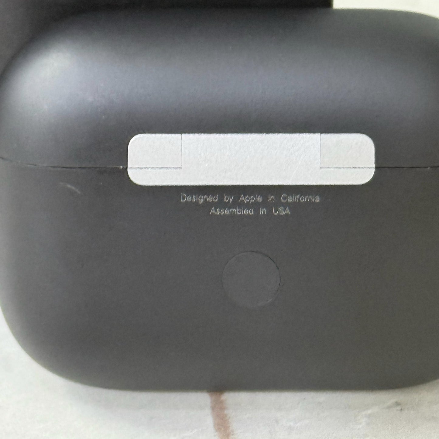 Matte black AirPods Pro-style wireless earbuds with active noise cancellation, displayed in an open charging case alongside a sleek black packaging box. The earbuds have a premium finish, making them a stylish choice for high-quality Bluetooth audio. Perf