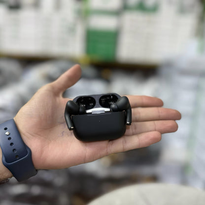 Matte black AirPods Pro-style wireless earbuds with active noise cancellation, displayed in an open charging case alongside a sleek black packaging box. The earbuds have a premium finish, making them a stylish choice for high-quality Bluetooth audio. Perf
